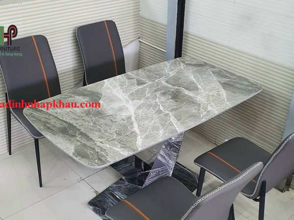 Bộ bàn ăn ghế chân chéo mặt đá